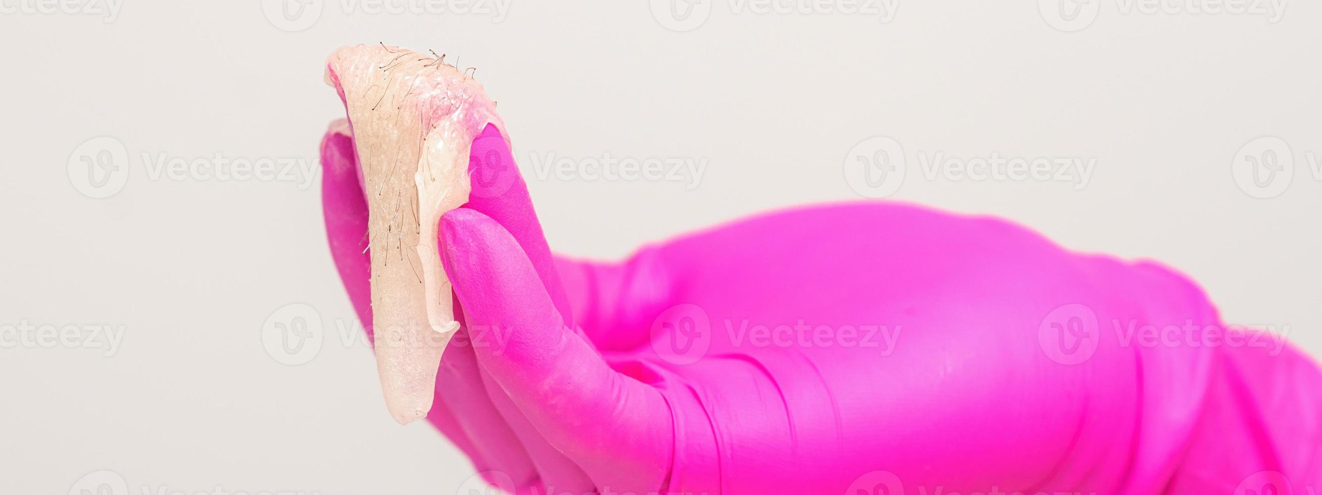 Hand with white sugar paste photo