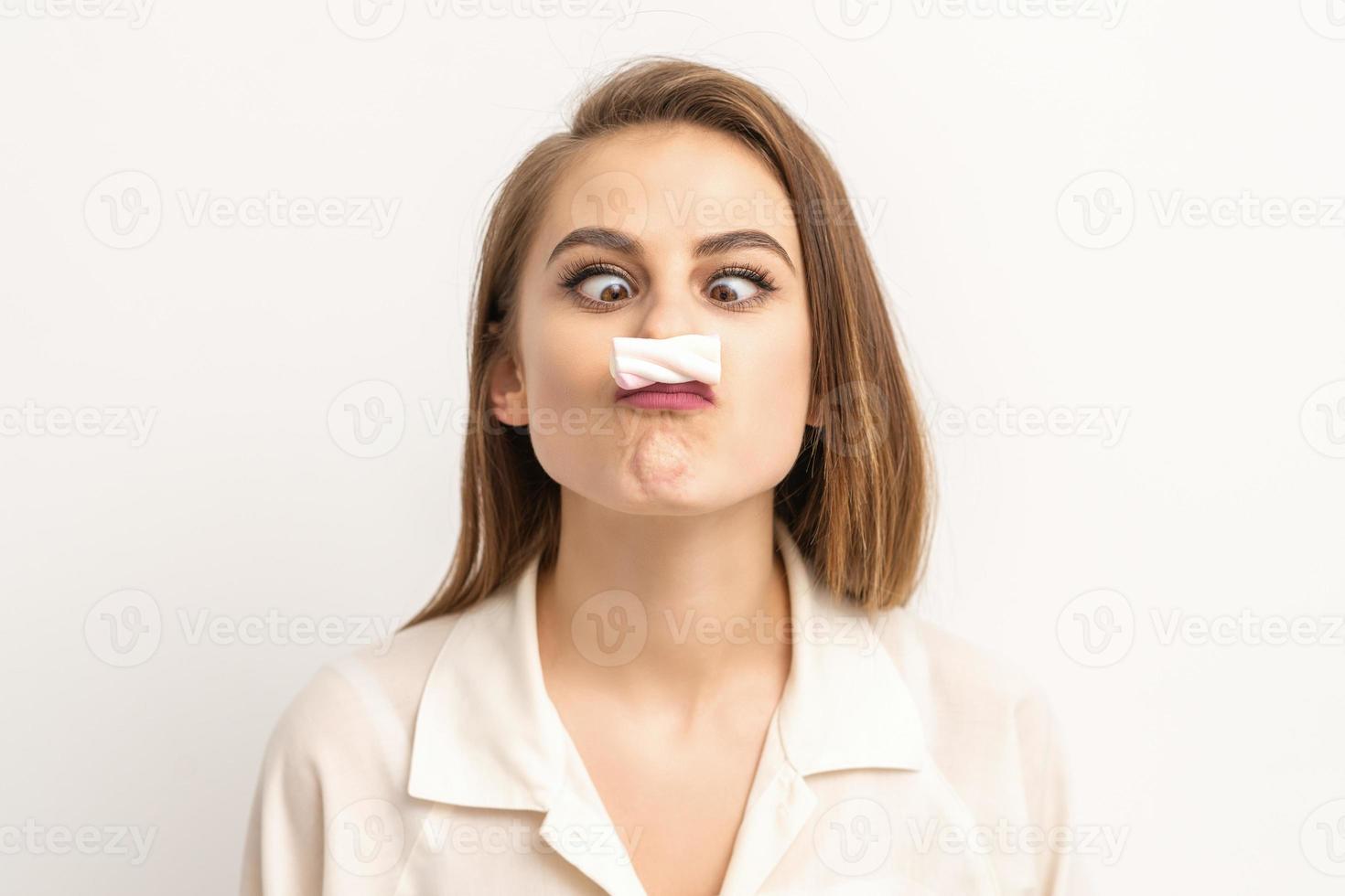 Woman with candy marshmallow-like mustache photo