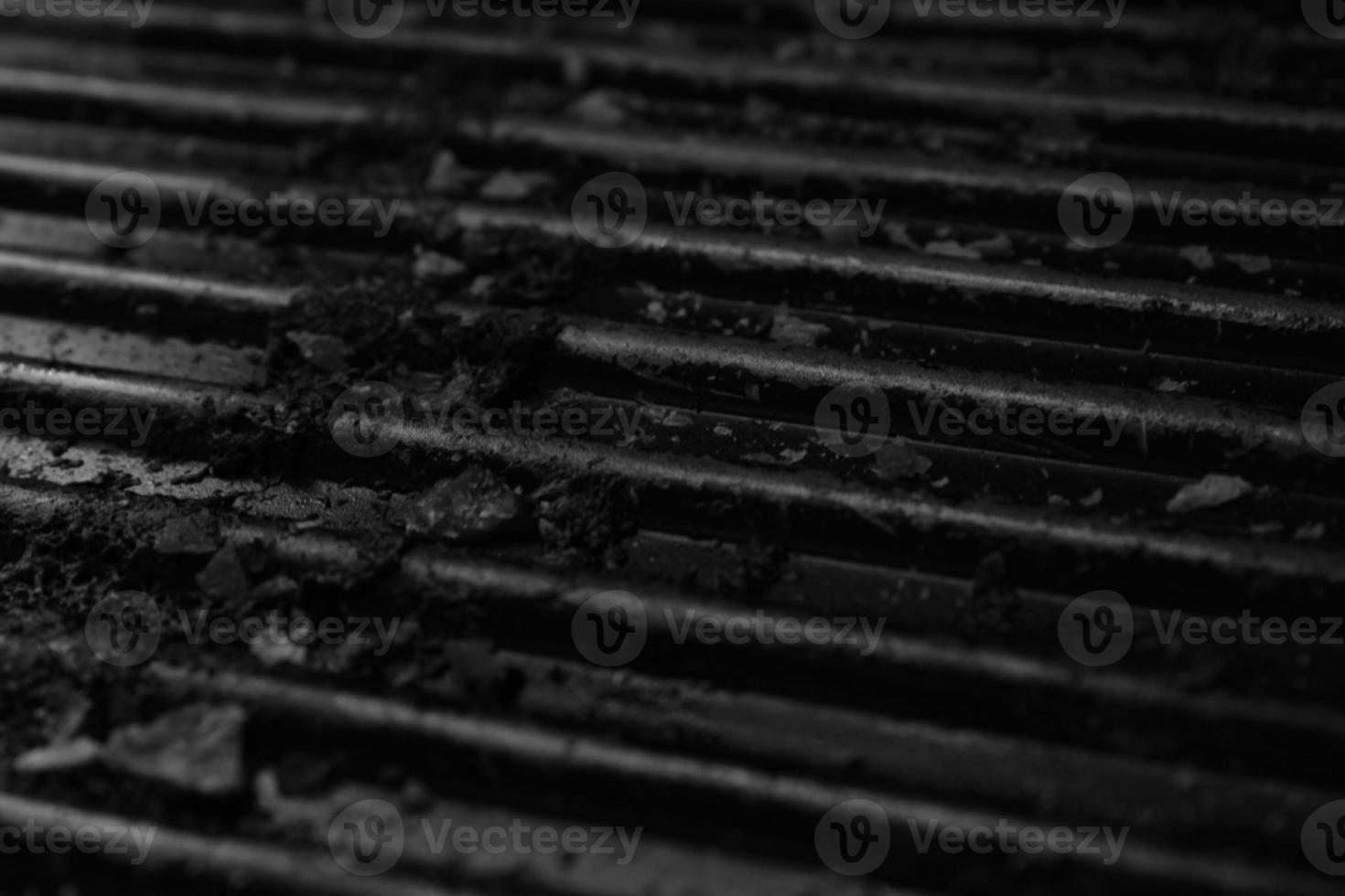 grill background, barbecue fire grill close-up, isolated on black background photography photo