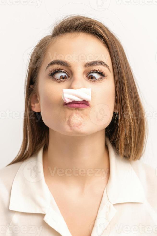 Woman with candy marshmallow-like mustache photo