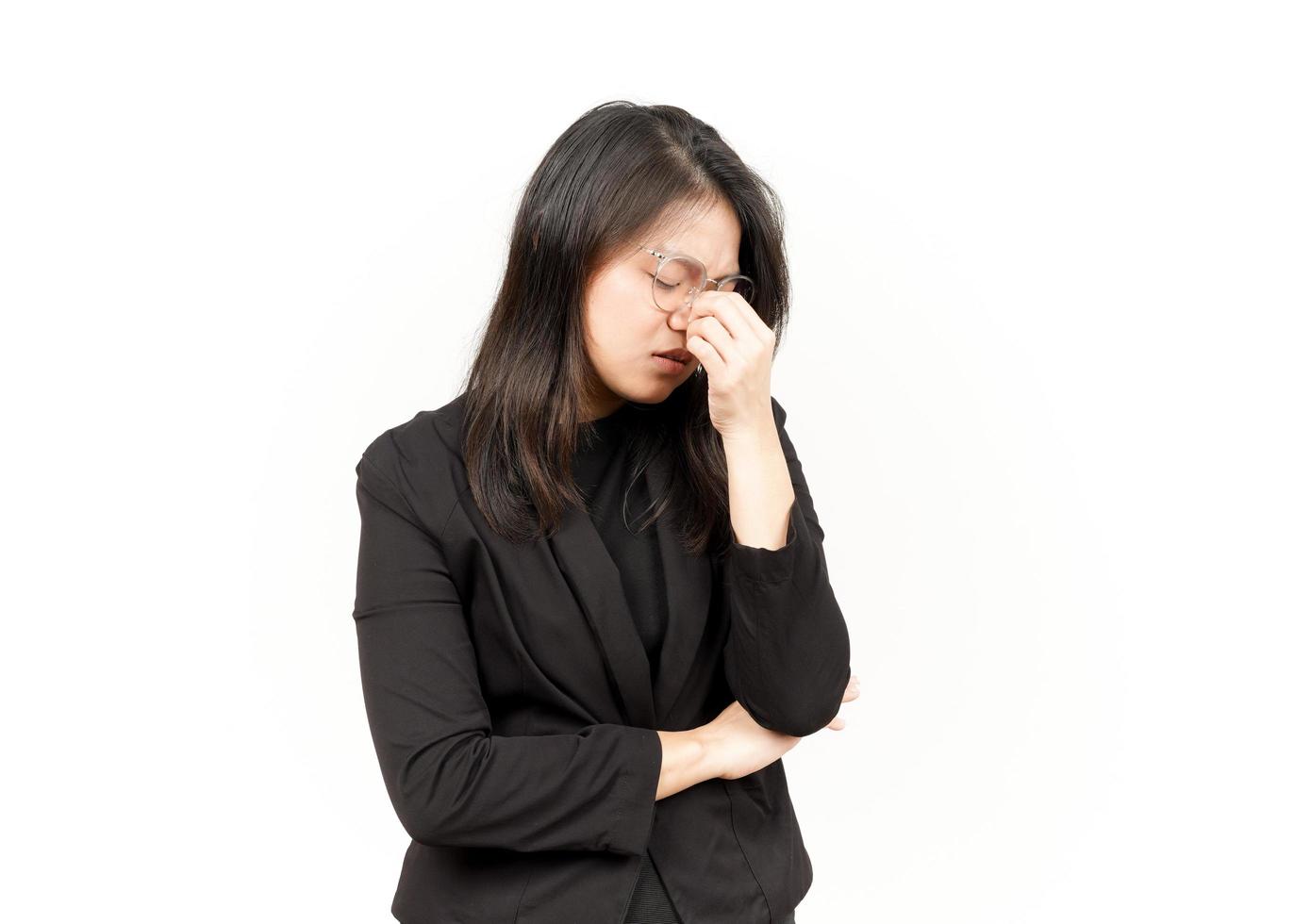 Suffering Headache Of Beautiful Asian Woman Wearing Black Blazer Isolated On White Background photo