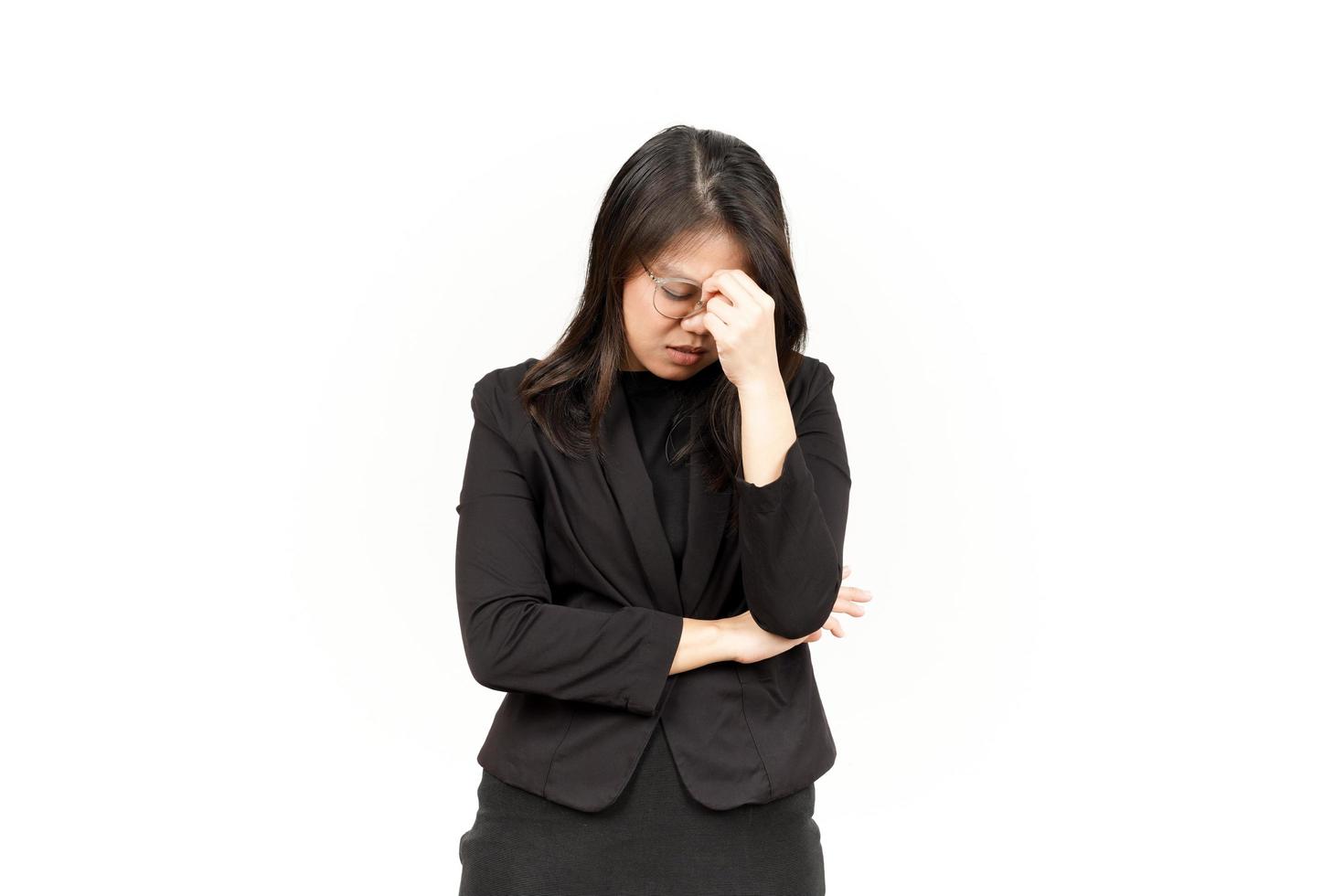 Suffering Headache Of Beautiful Asian Woman Wearing Black Blazer Isolated On White Background photo