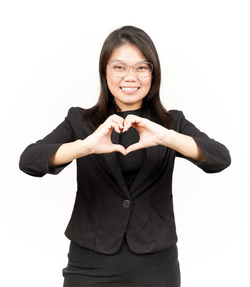 Showing Love Sign Of Beautiful Asian Woman Wearing Black Blazer Isolated On White Background photo