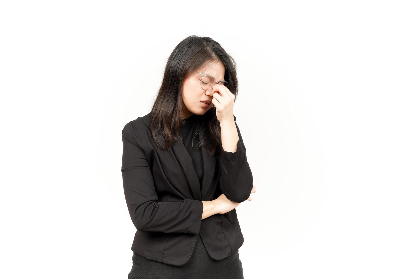 Suffering Headache Of Beautiful Asian Woman Wearing Black Blazer Isolated On White Background photo