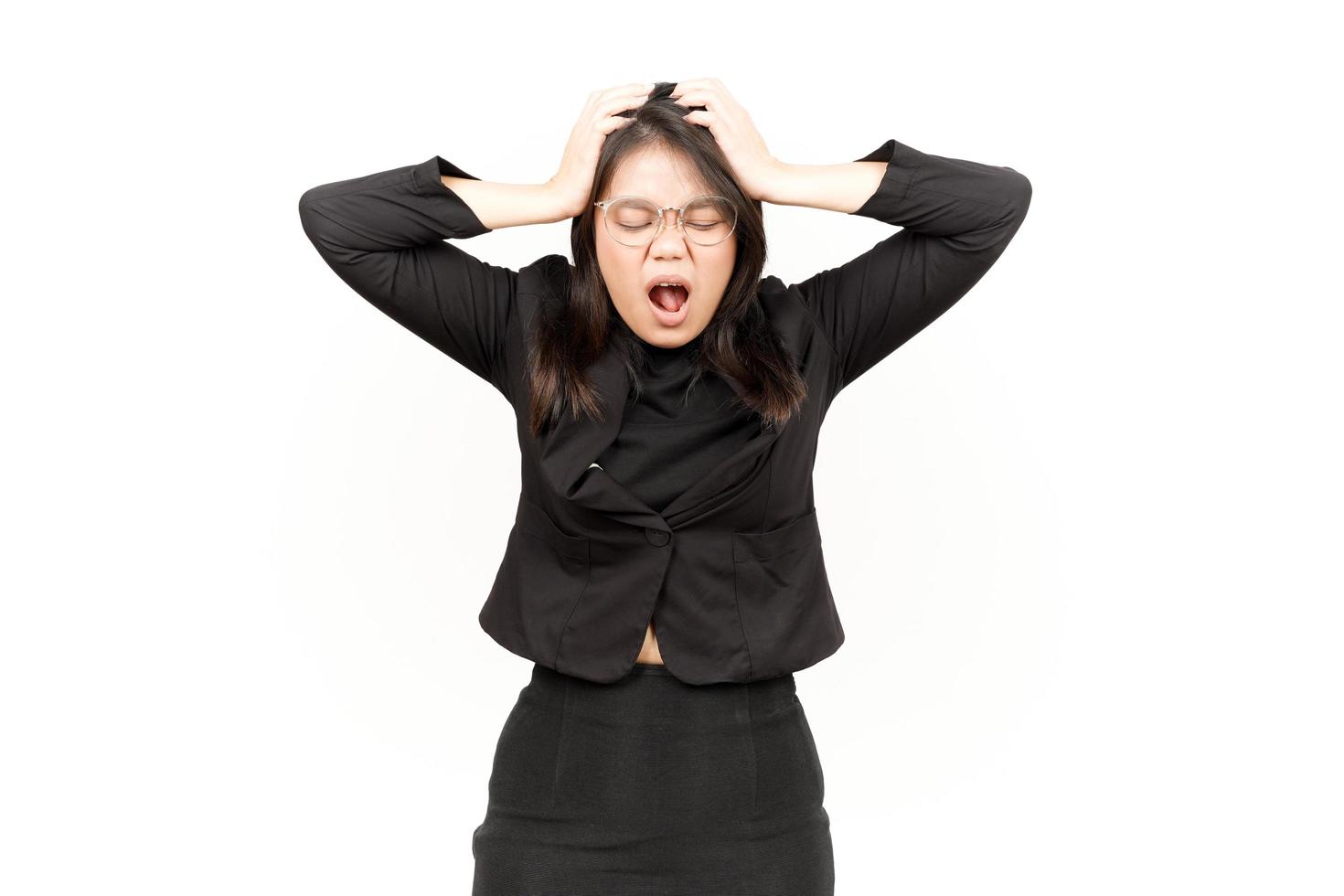 Suffering Headache Of Beautiful Asian Woman Wearing Black Blazer Isolated On White Background photo