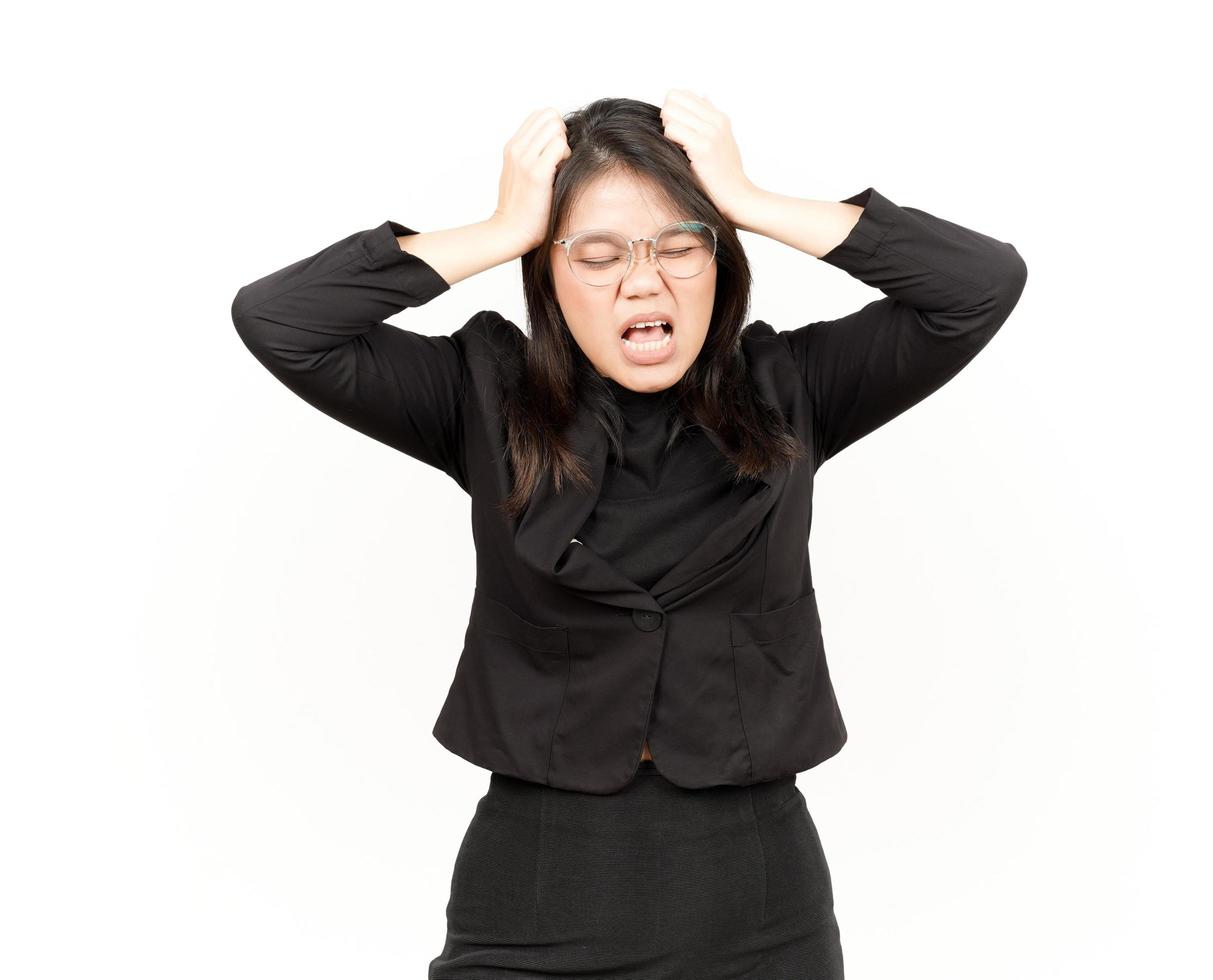 Suffering Headache Of Beautiful Asian Woman Wearing Black Blazer Isolated On White Background photo