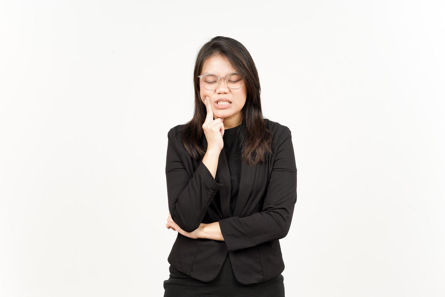 Suffering Toothache Of Beautiful Asian Woman Wearing Black Blazer Isolated On White Background photo