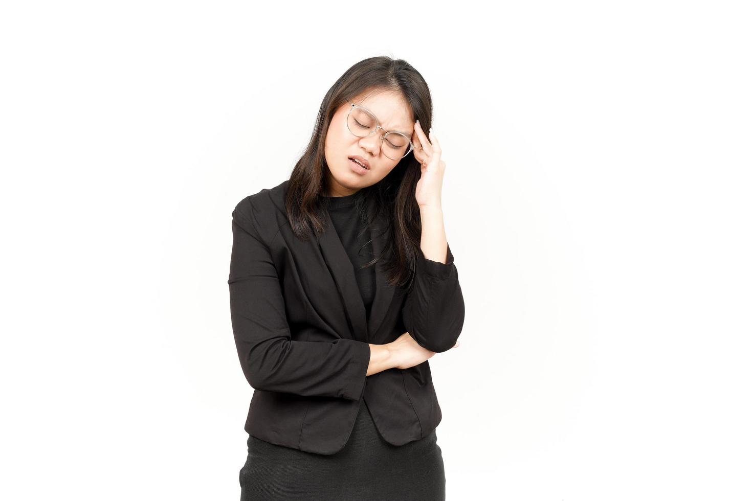 Suffering Headache Of Beautiful Asian Woman Wearing Black Blazer Isolated On White Background photo