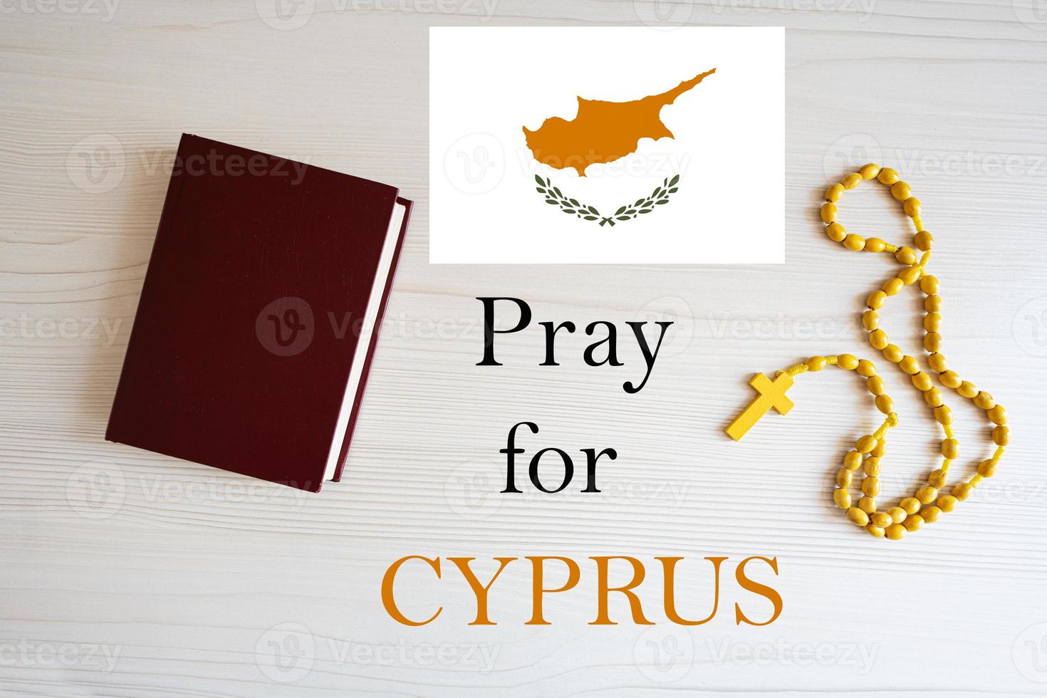 Pray for Cyprus. Rosary and Holy Bible background. photo