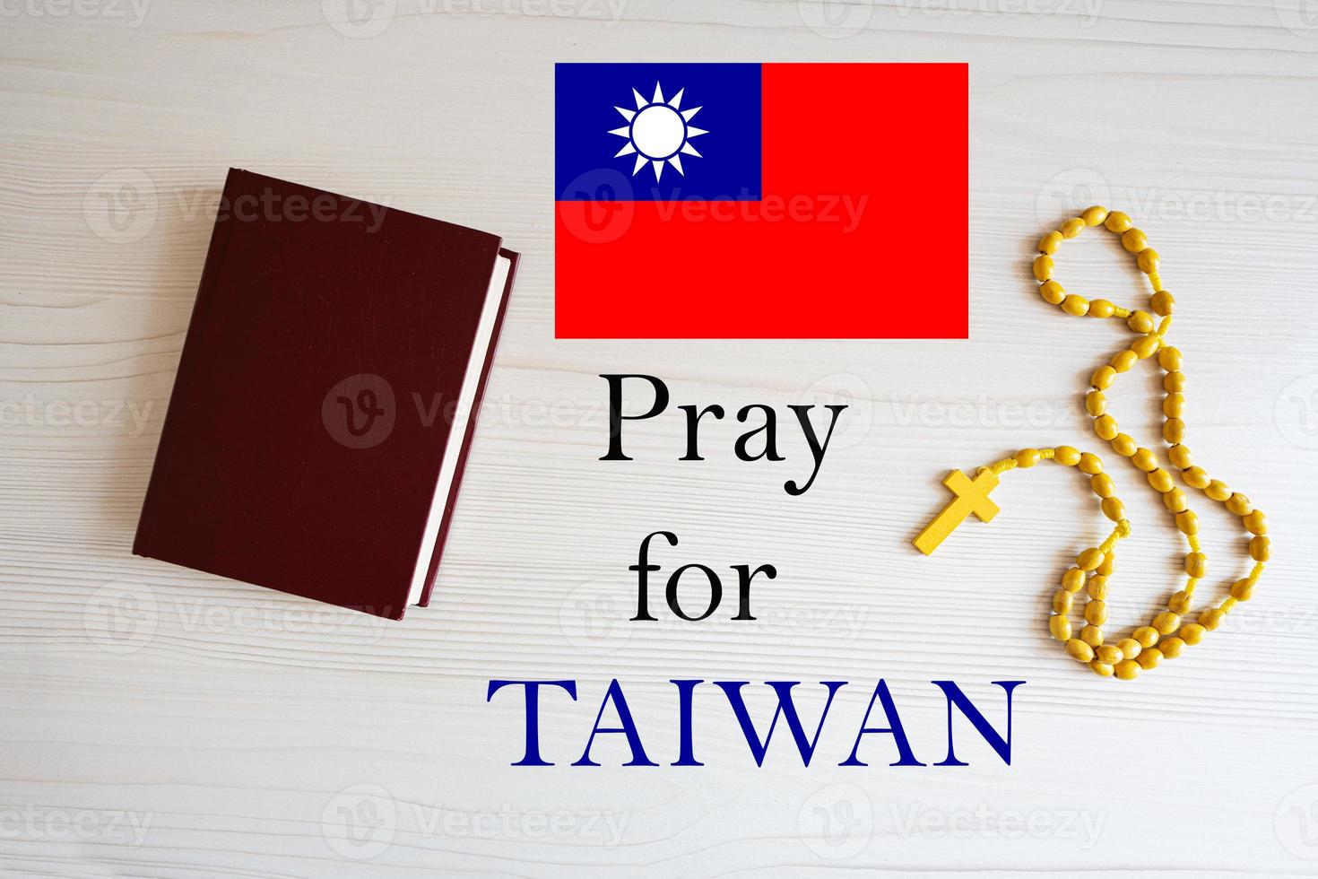 Pray for Taiwan. Rosary and Holy Bible background. photo