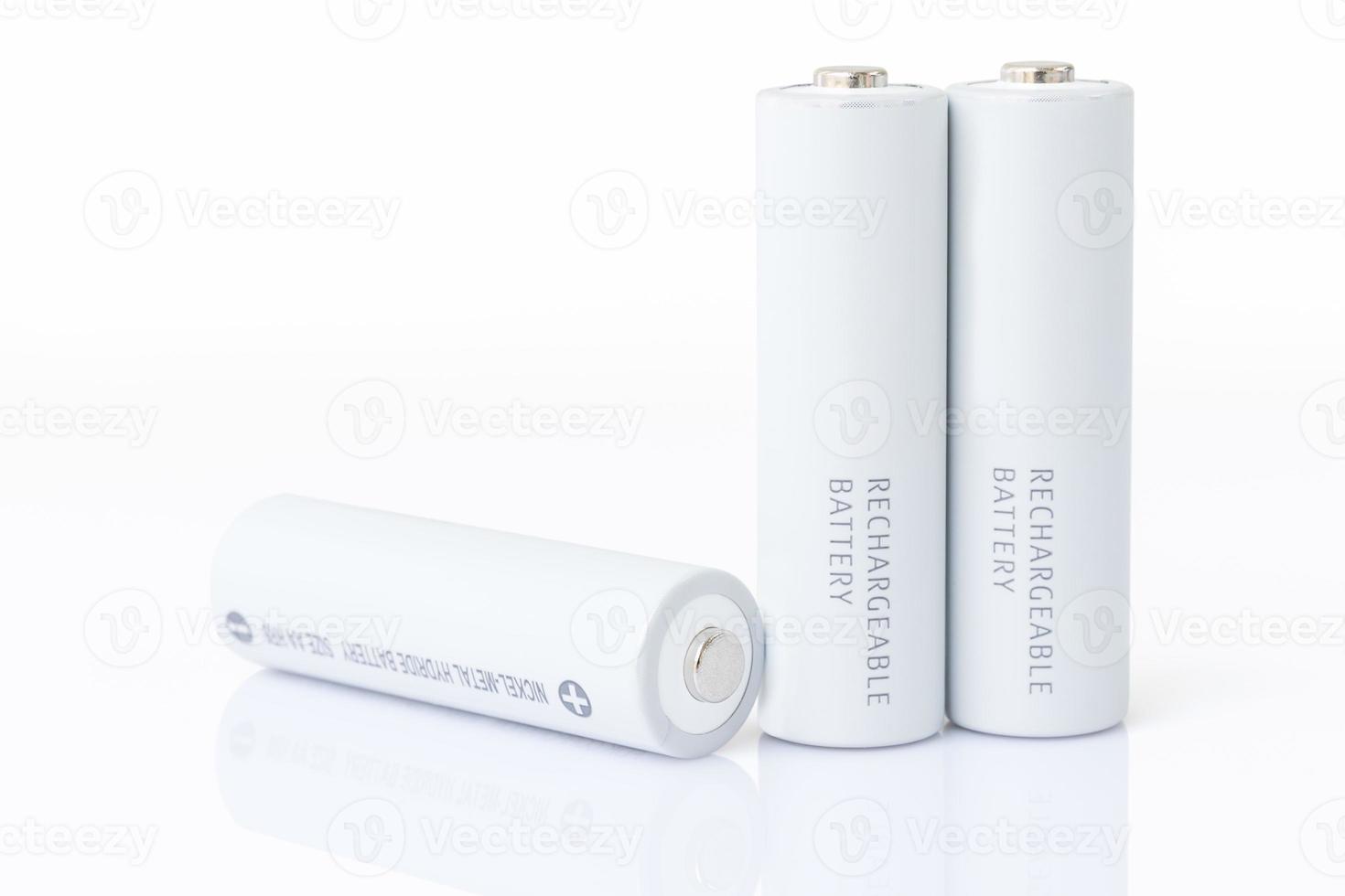 AA batteries over white photo