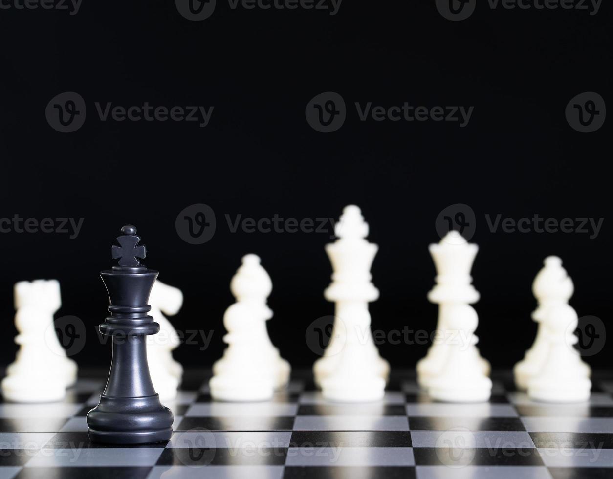 Chess pieces on chessboard photo