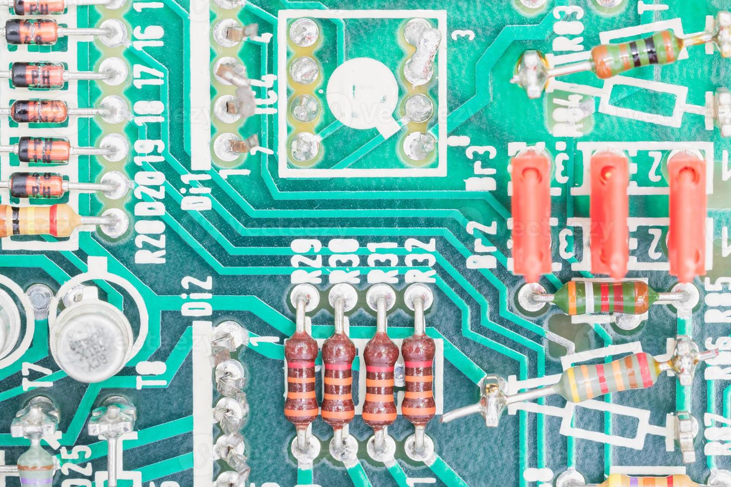 Condensers and Resistor assembly on the circuit board photo