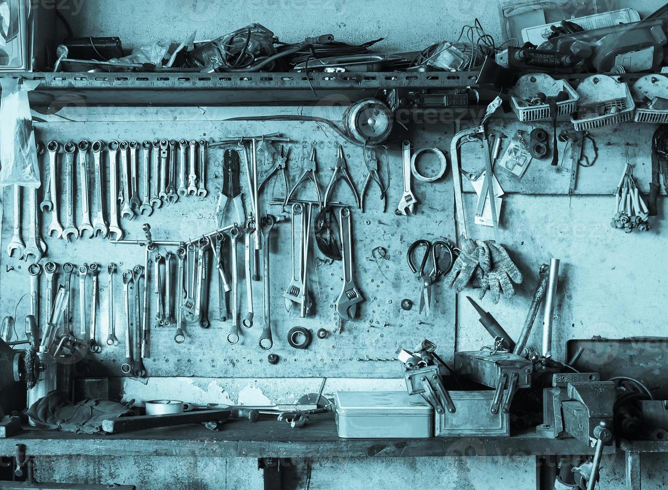 Old tool shelf against a wall photo