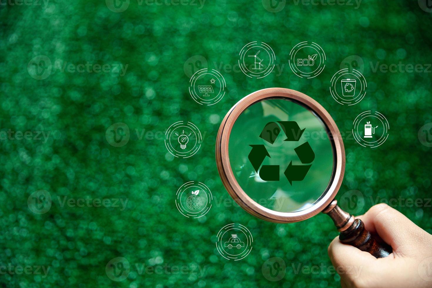 Carbon credit concept. CO2 reducing icon inside magnifier glass on green background, Tradable certificate to drive industry in direction of low emissions in efficiency cost. decrease CO2 photo