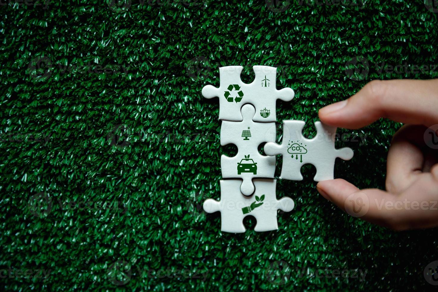 Companies are targeting net zero greenhouse gas emissions. Carbon credit conceptTradable certificate to drive industry in direction of low emissions in efficiency costJigsaw puzzle with decrease CO2 photo