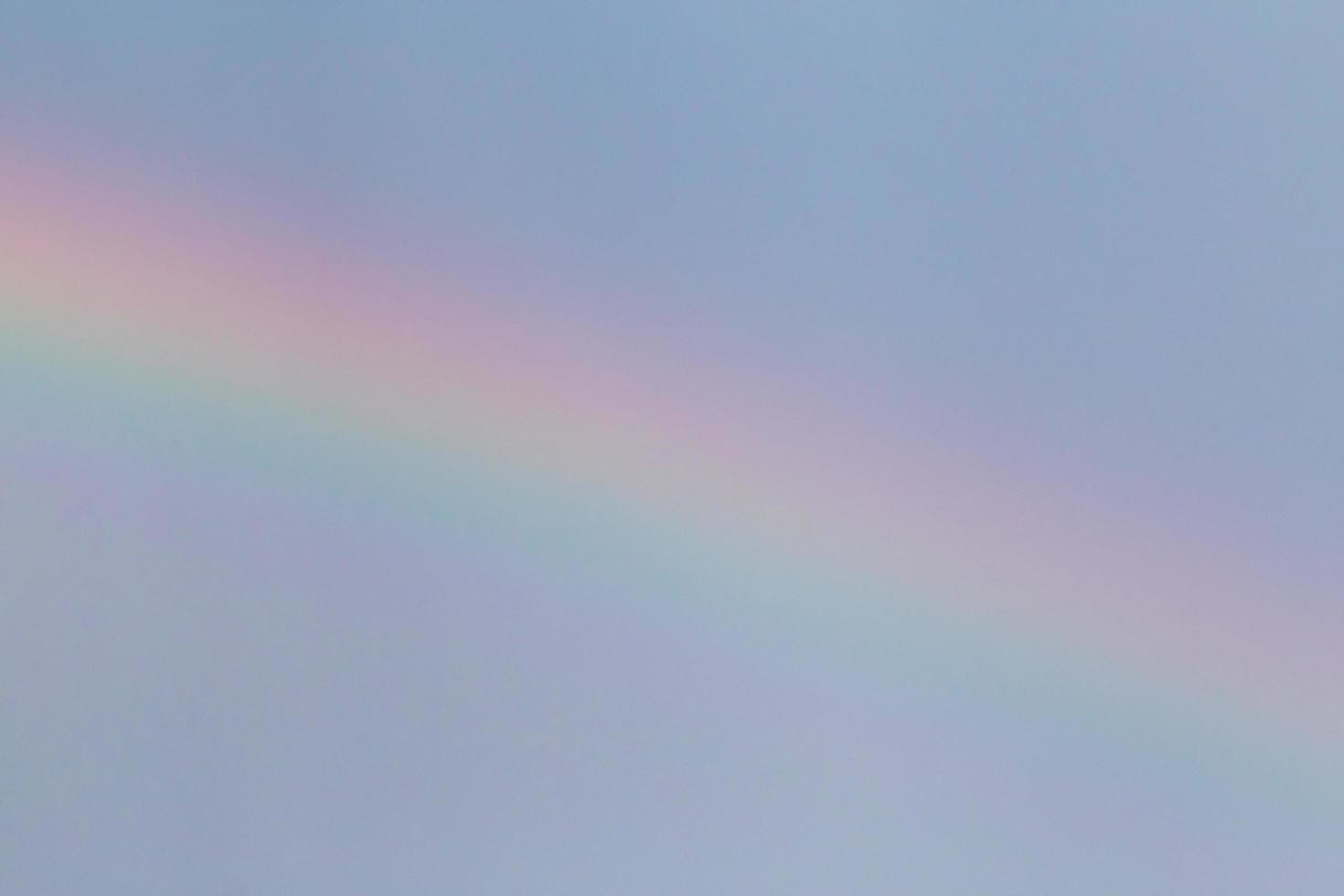 close up of rainbow in a sky at rain photo