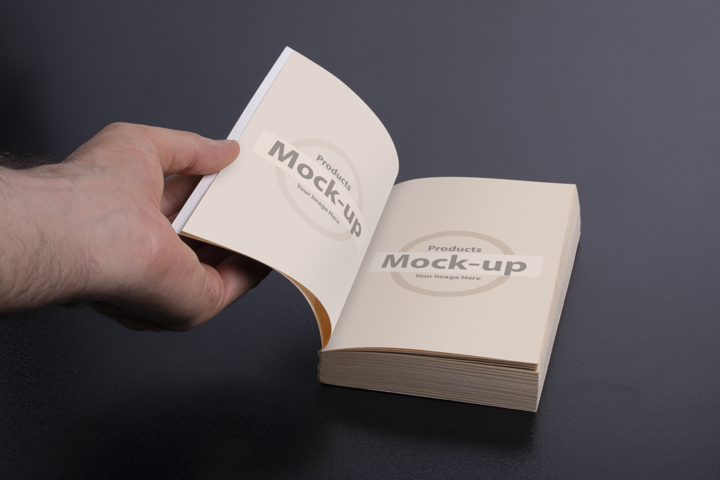 A man hand opening a novel book psd