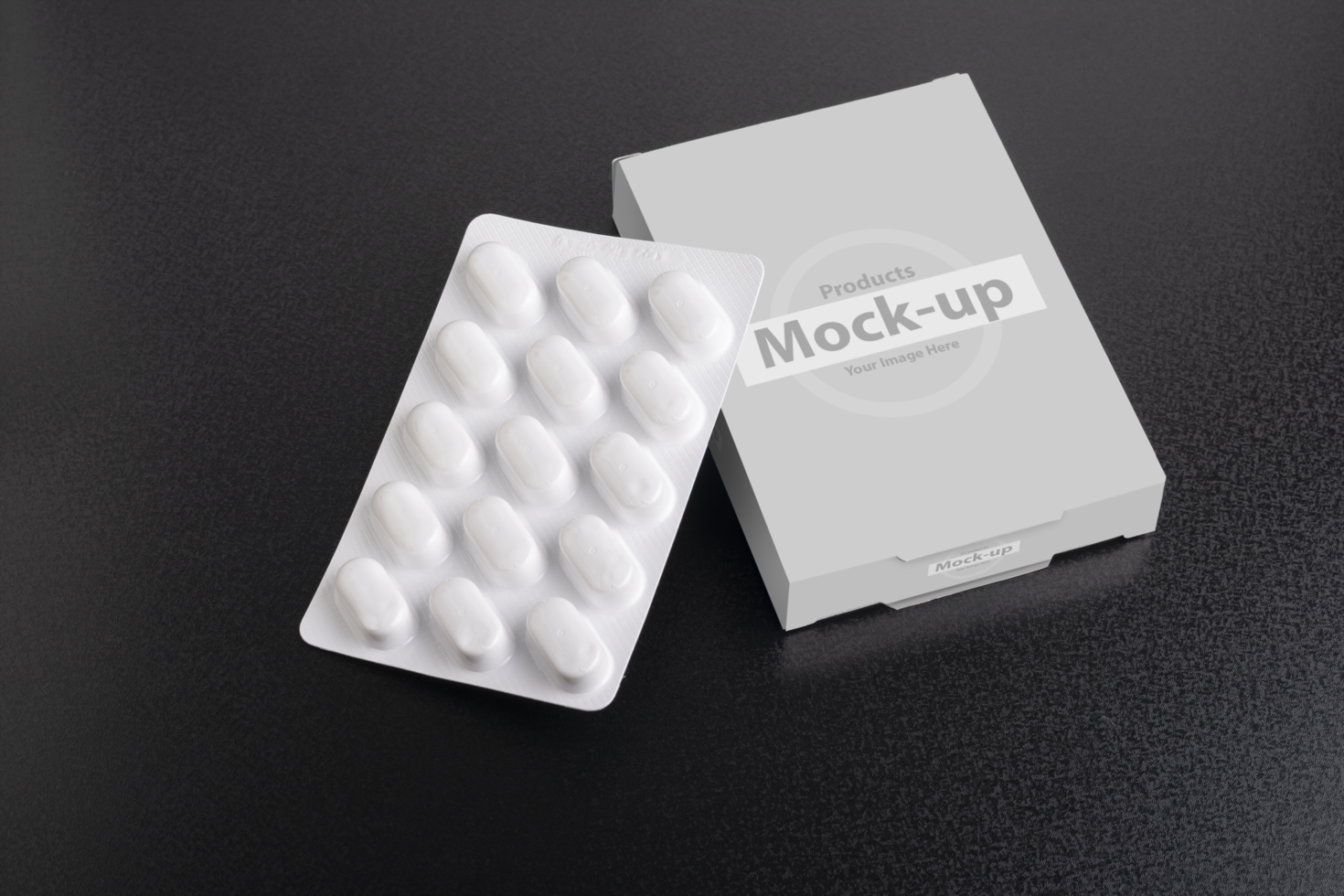 Pillbox with loaf of tablets on dark background psd
