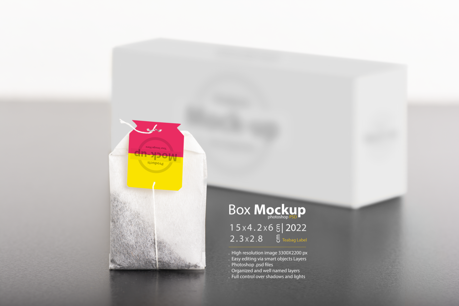 A single tea bag in front of blurred pack psd