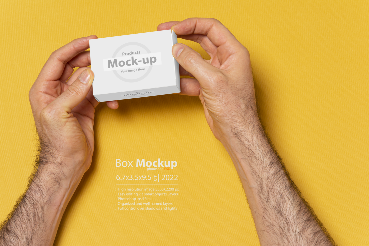 A man hands opening a box in front of yellow background psd