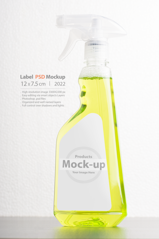 Cleaning liquid bottle in front of  light gray background psd