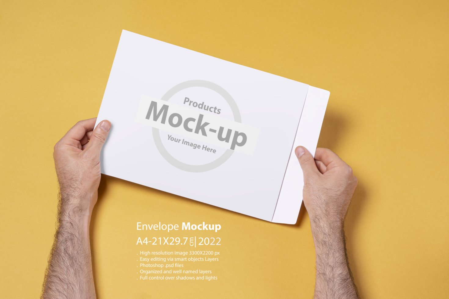 Male hand holding an A4 paper envelope psd
