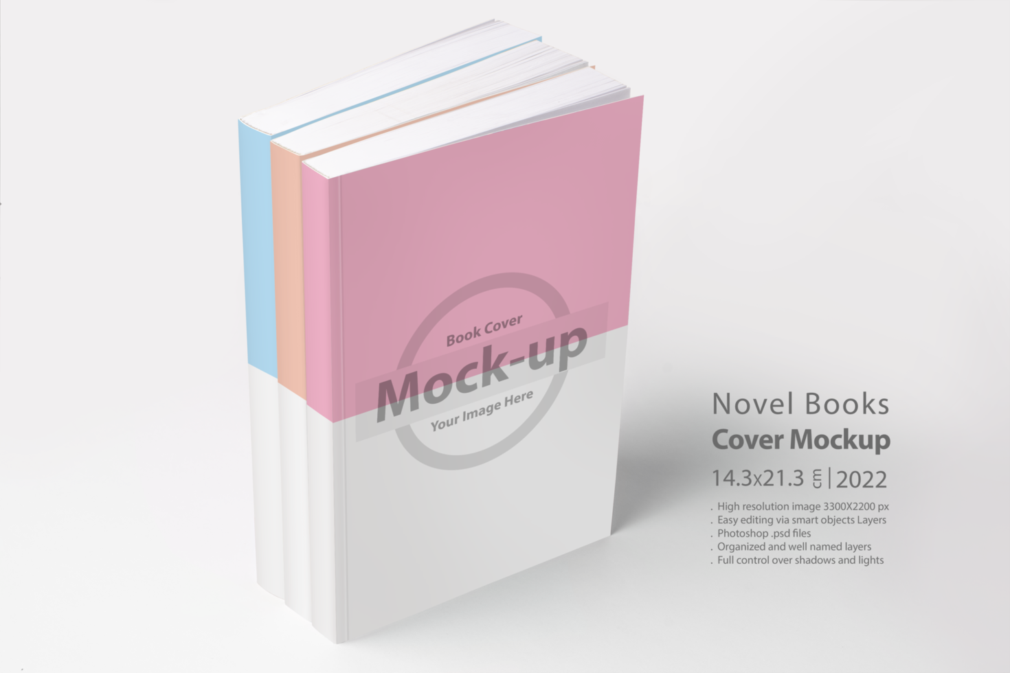 Three books with blank cover on table psd