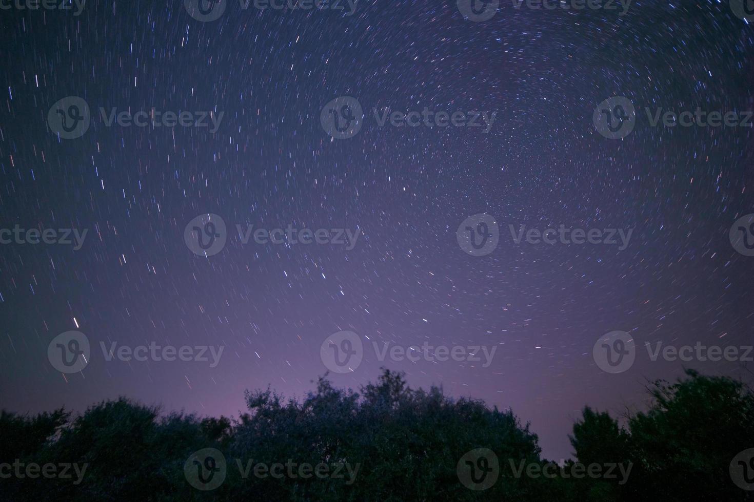 view on traces of stars around Polar star at night photo