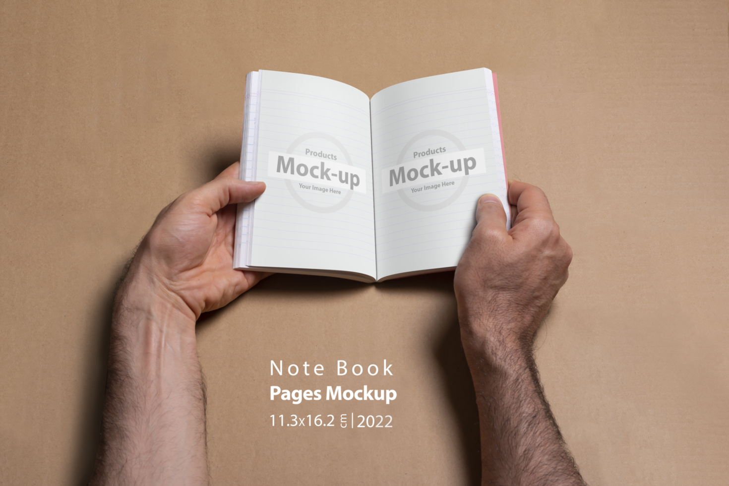 Male hands holding an opened note book-catalog with blank pages on brown background psd