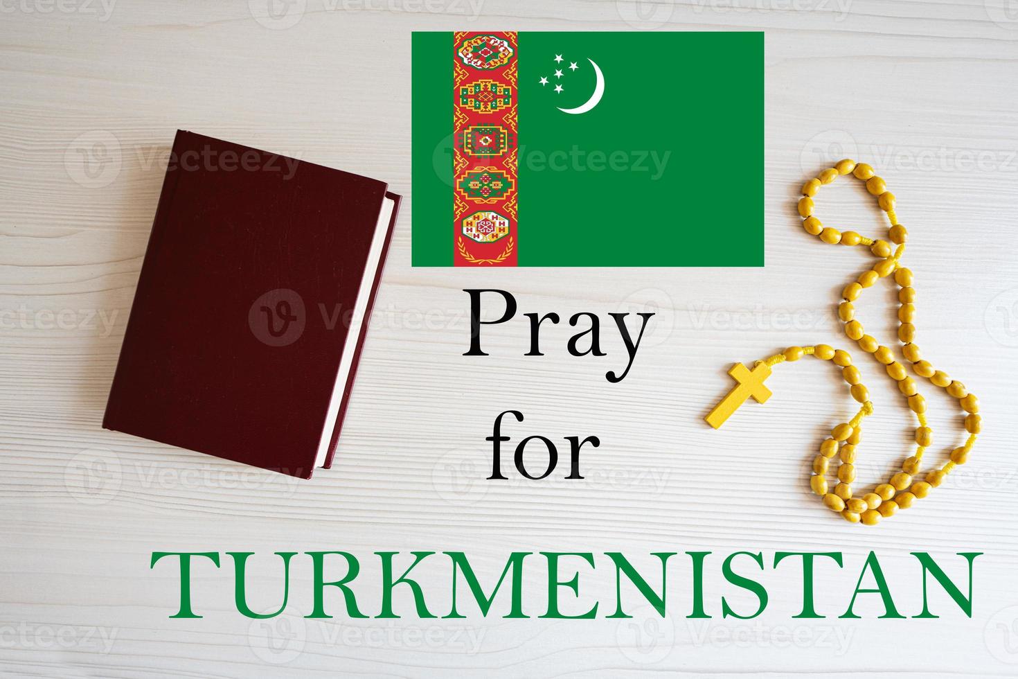 Pray for Turkmenistan. Rosary and Holy Bible background. photo