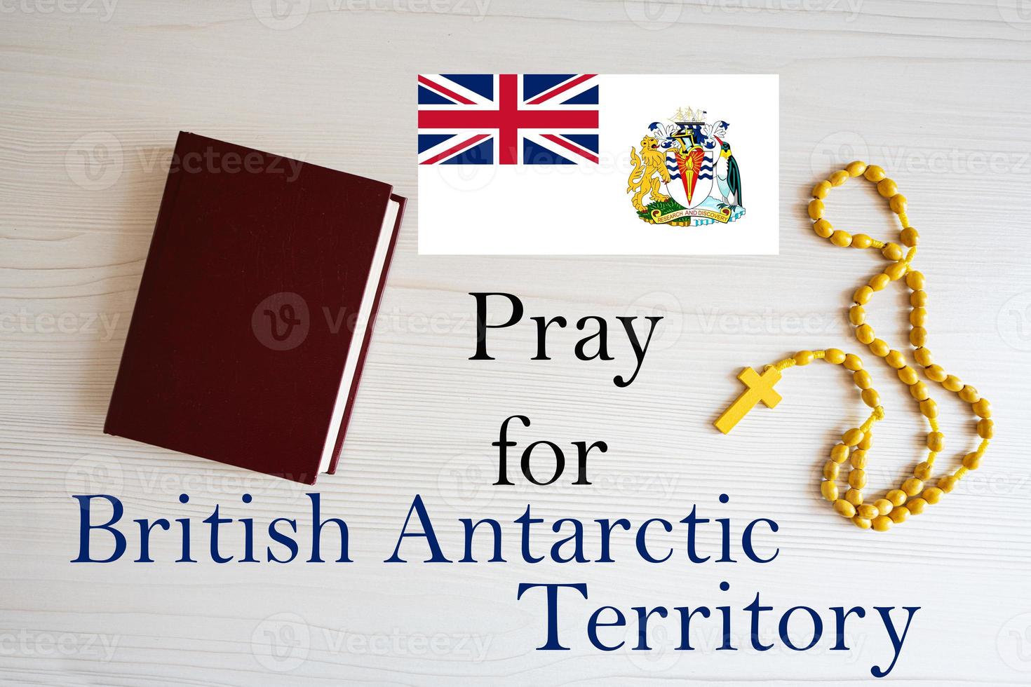 Pray for British Antartic Territory. Rosary and Holy Bible background. photo