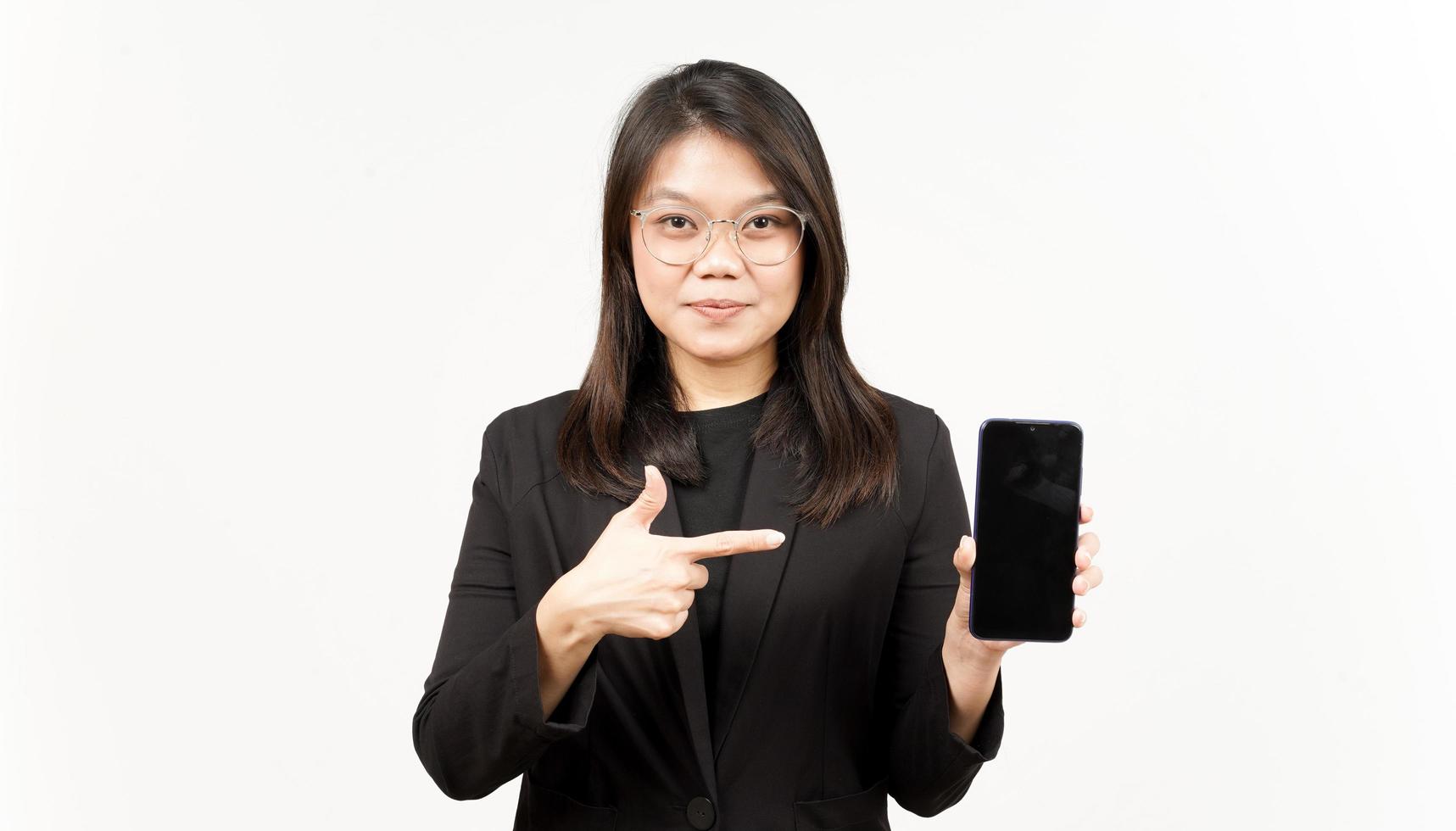 Showing Apps or Ads On Blank Screen Smartphone Of Beautiful Asian Woman Wearing Black Blazer photo