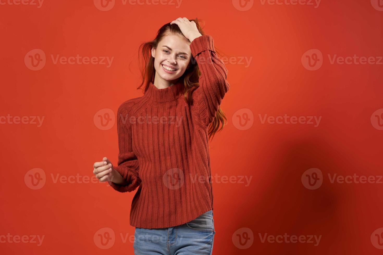 cheerful pretty woman red background studio close-up photo