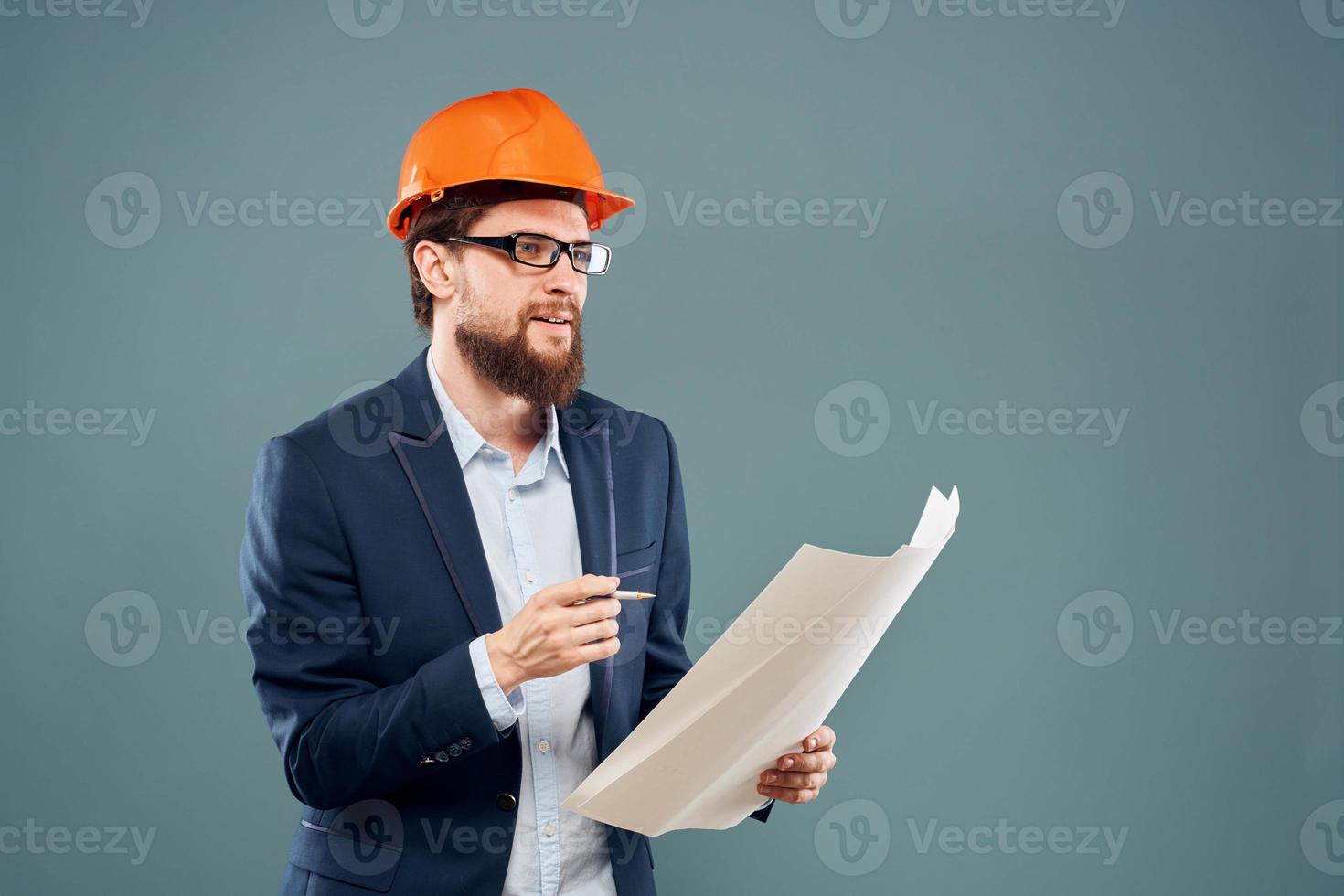 Man in safety suit orange helmet construction industry professional photo
