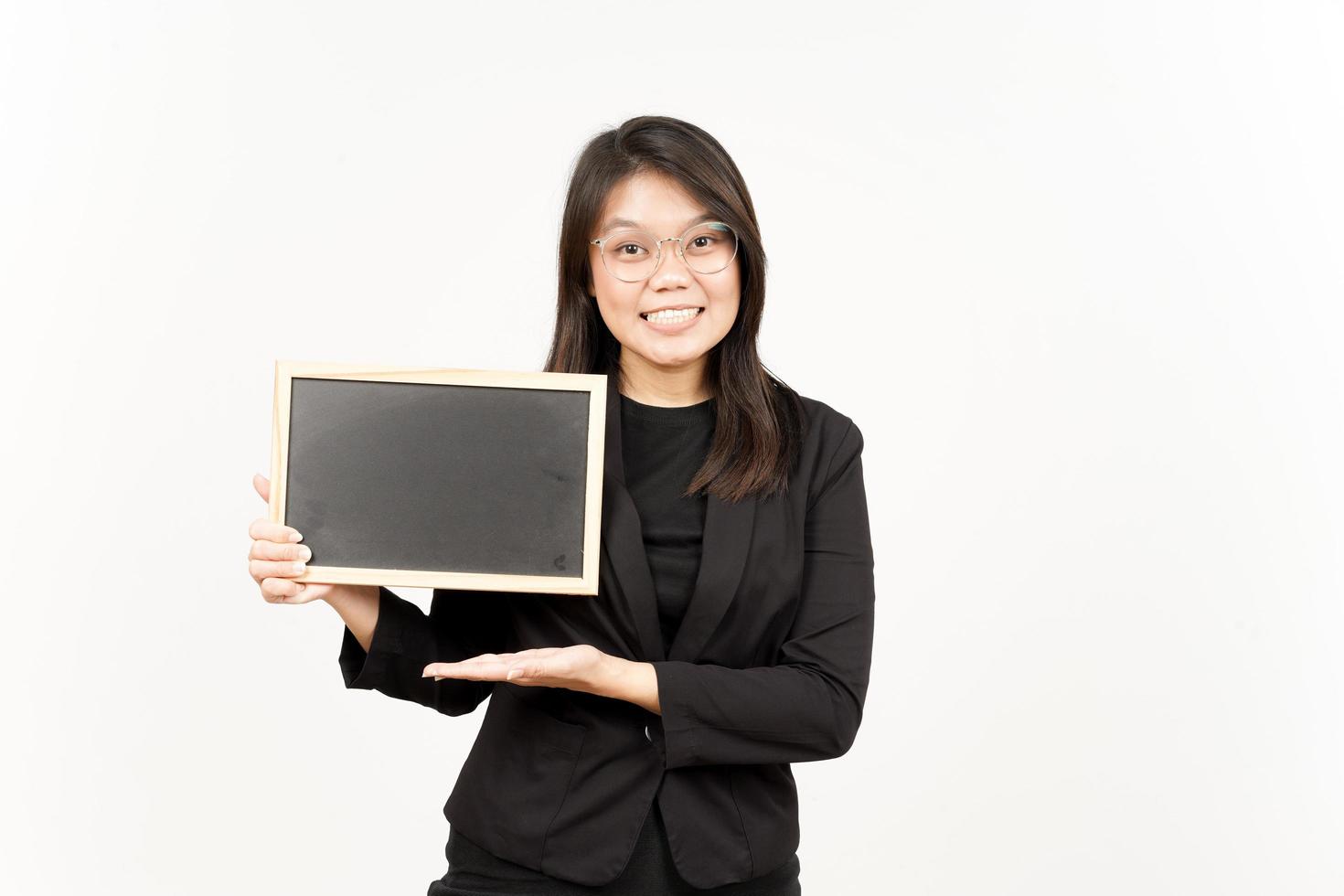 Showing, Presenting and holding Blank Blackboard Of Beautiful Asian Woman Wearing Black Blazer photo