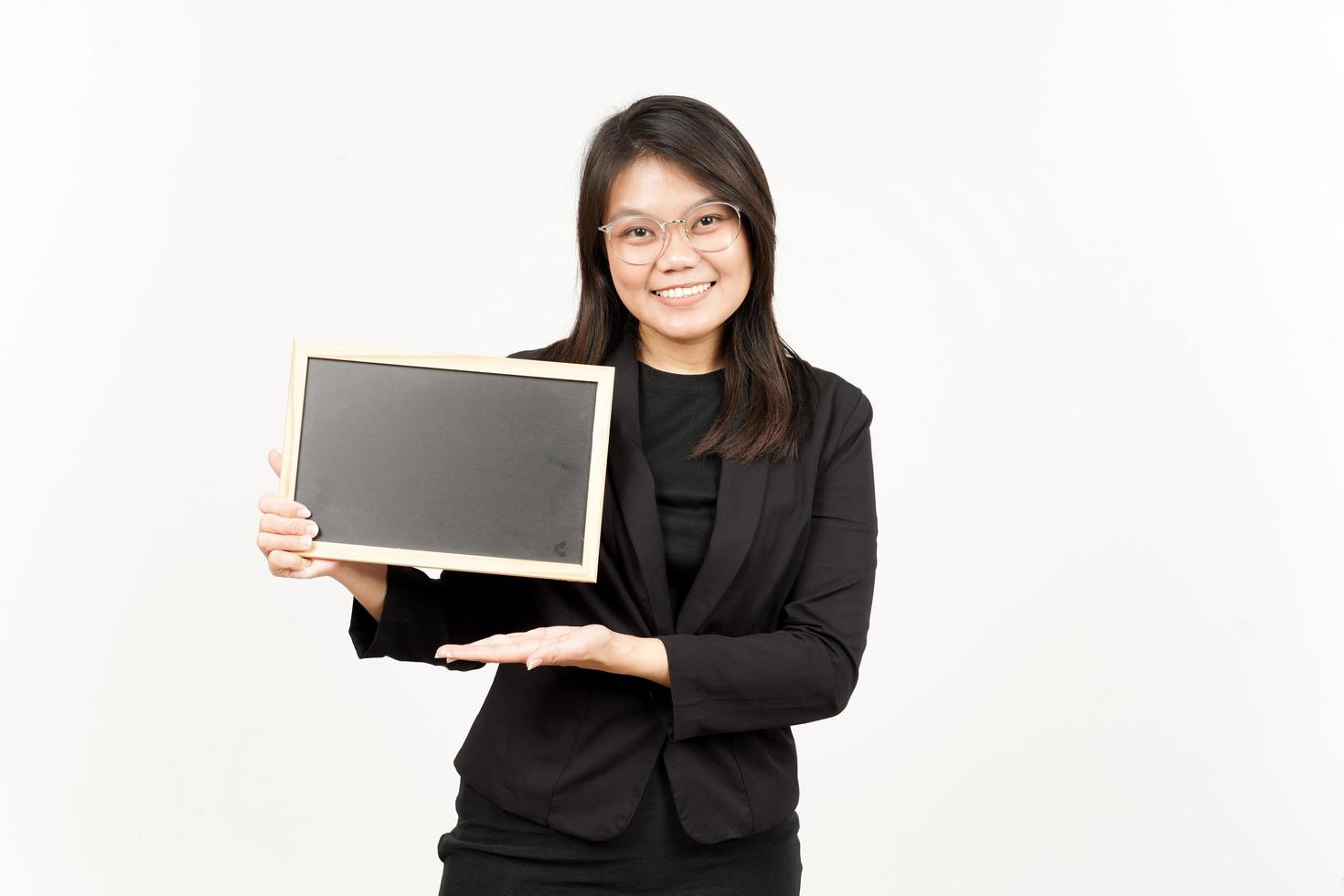 Showing, Presenting and holding Blank Blackboard Of Beautiful Asian Woman Wearing Black Blazer photo