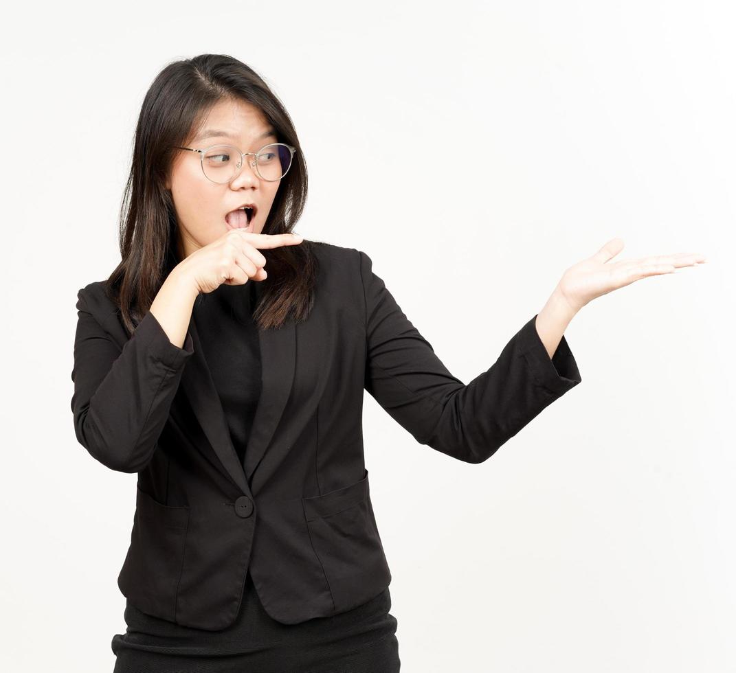 Showing and Presenting Product on Open Palm Of Beautiful Asian Woman Wearing Black Blazer photo