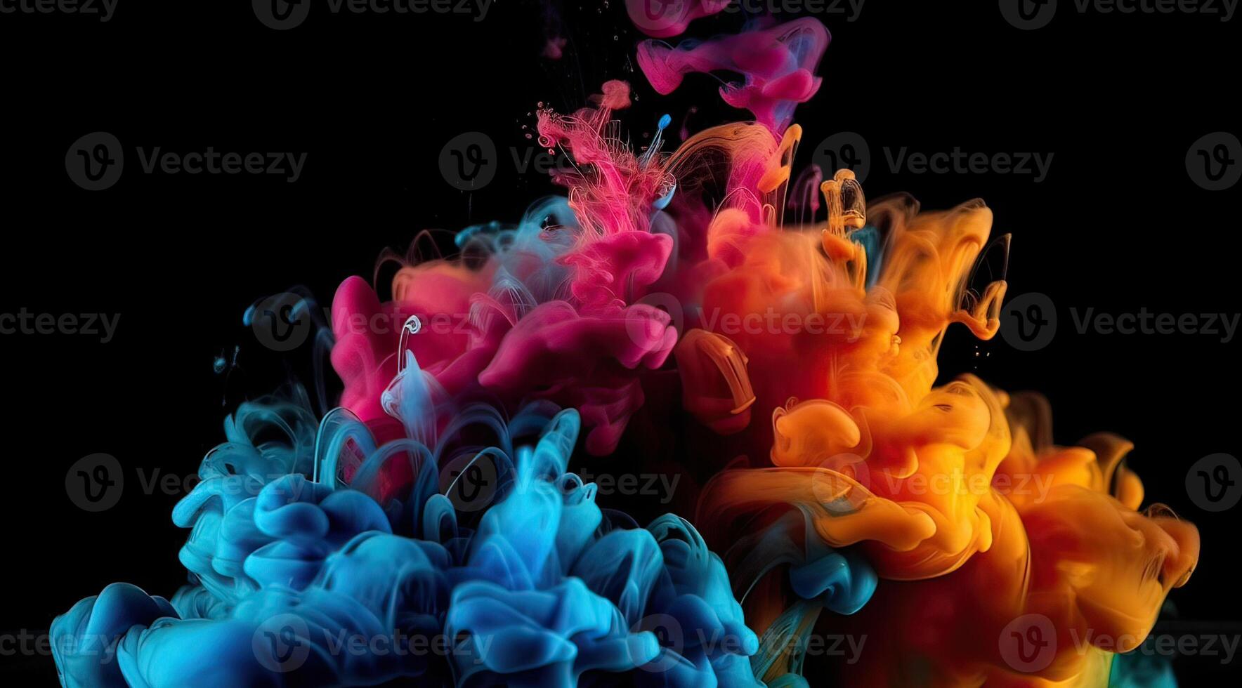 Rainbow of colors. Colors explosion. Ink in water isolated on black background. . photo