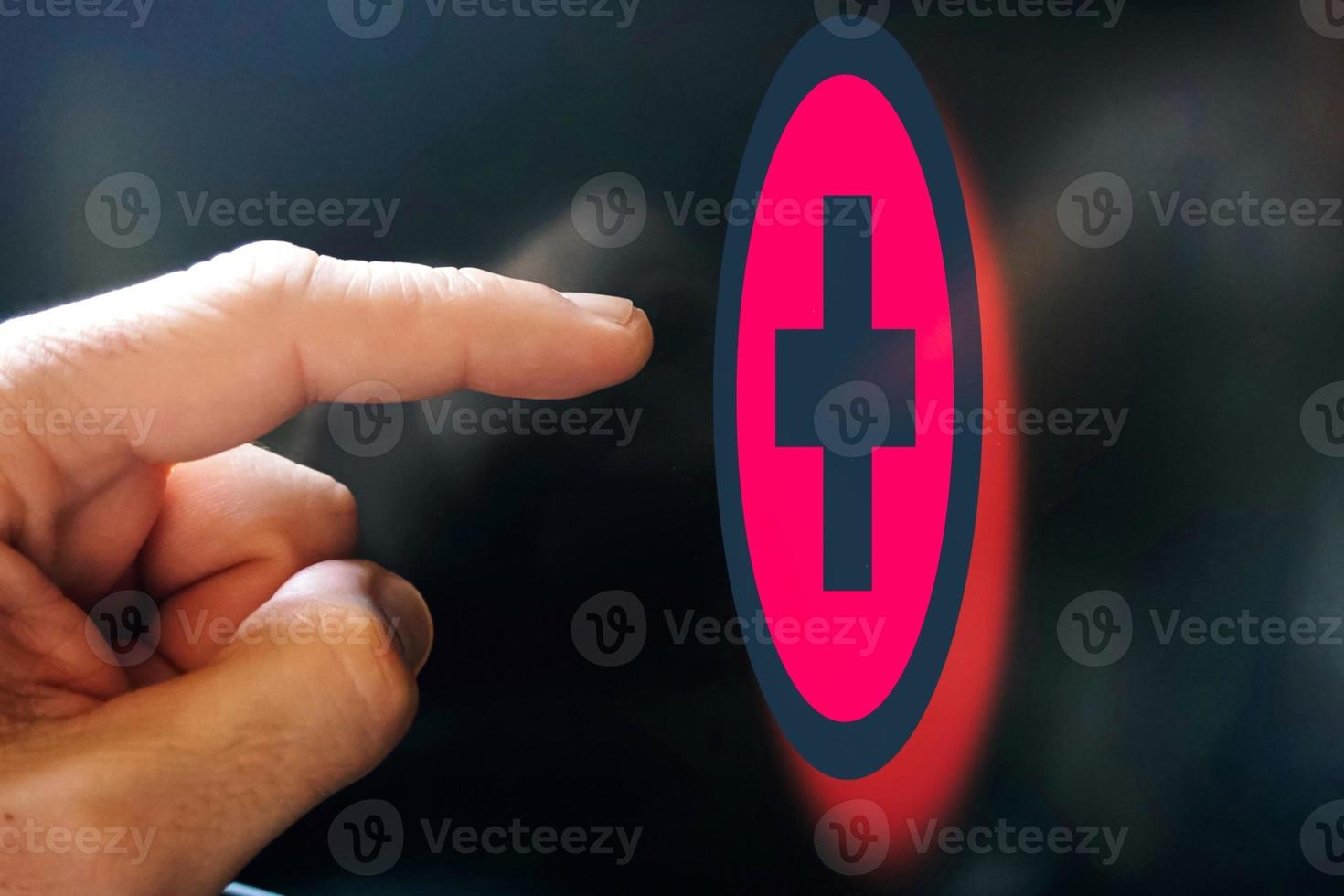 index finger pointing at health app, health insurance photo