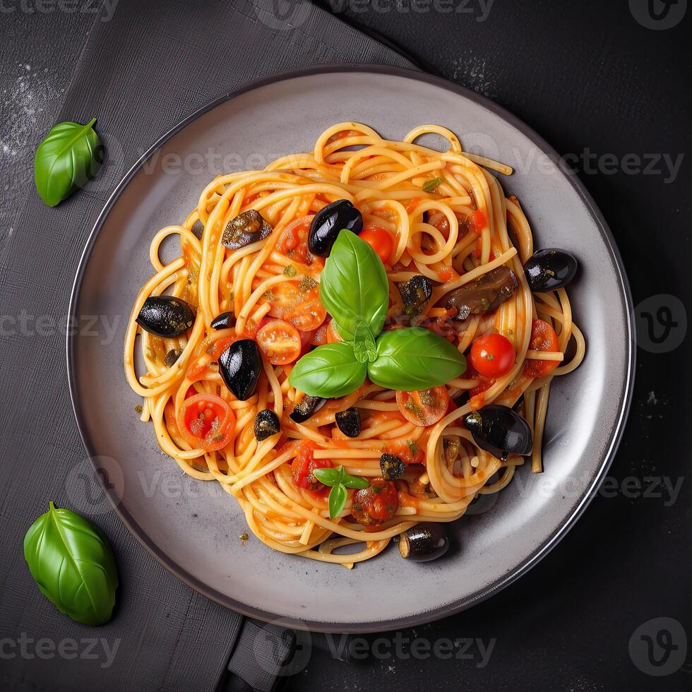 espaguetis. italiano pasta plato con Tomates, negro Olivos, alcaparras, anchoas y albahaca en oscuro mesa. parte superior vista. generativo ai. foto