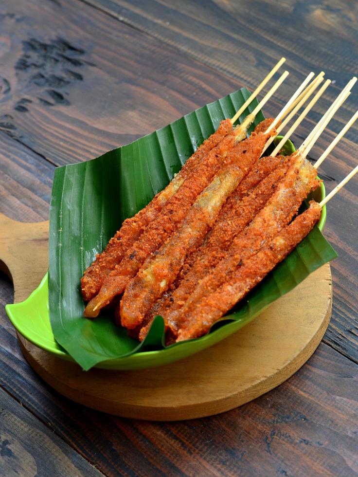 cilung or aci digulung food made from tapioca flour, traditional food from indonesia photo