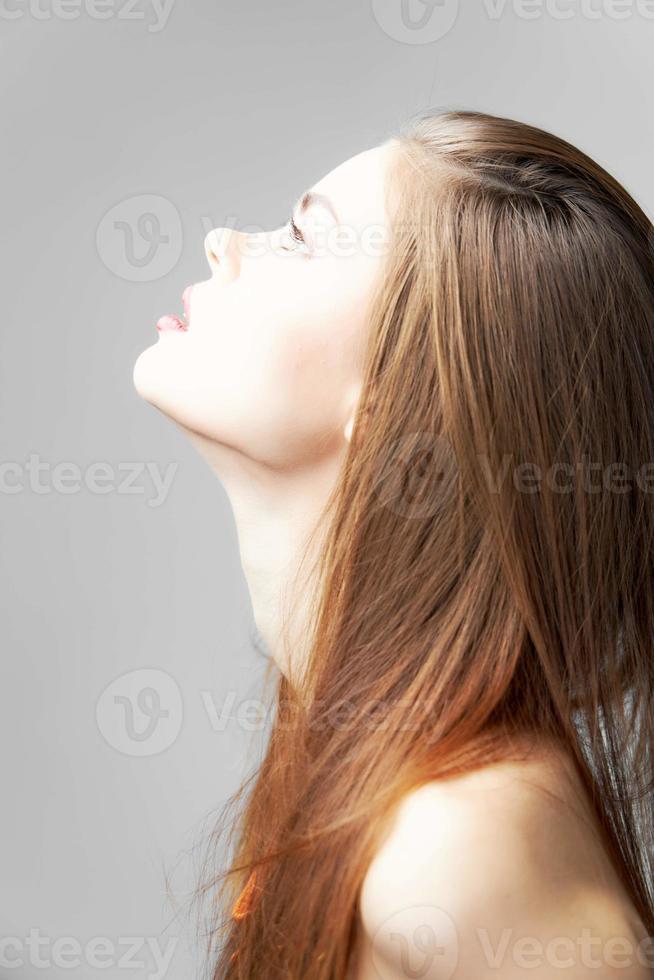 Woman looking up side view cropped view photo