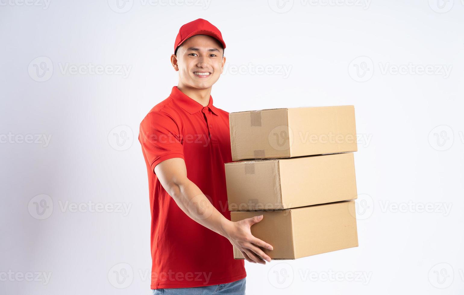 portrait of asian delivery man on white background photo
