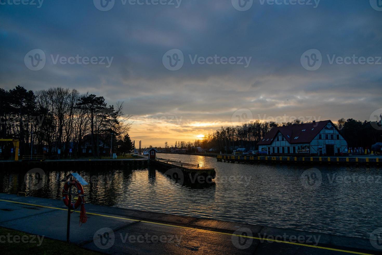 winter sunset on the leba river in Poland landscape photo