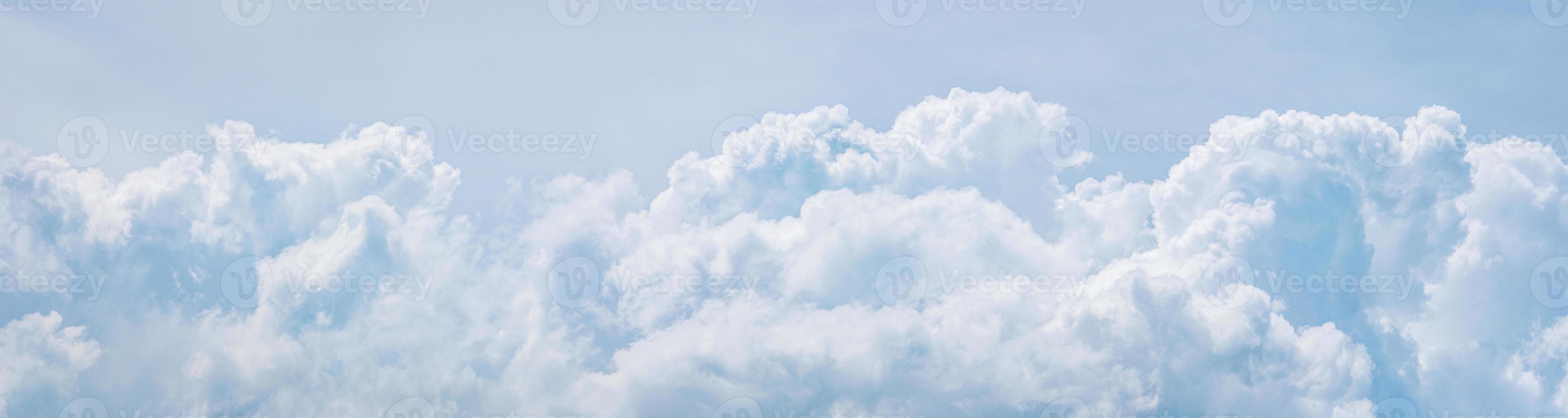 Light blue cumulus clouds texture, wide summer sky background photo