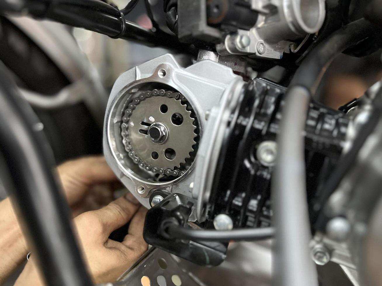 motorcycle service engine repair close up.  Maintenance of motorcycle engine. photo