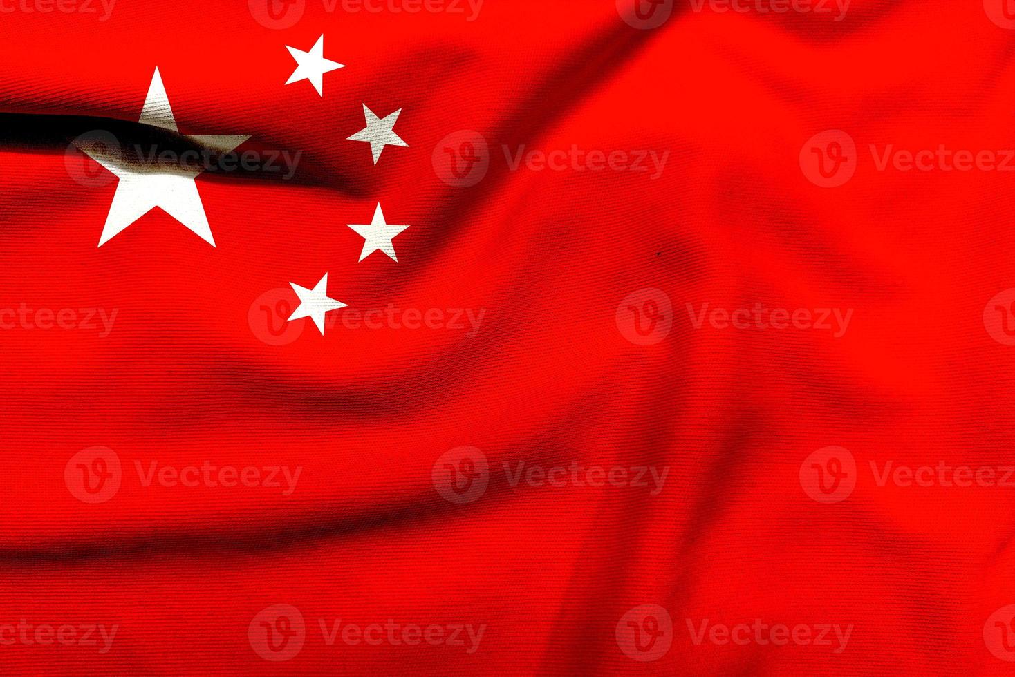 China flag on the textured cloth, Contemporary Take on the Red and Yellow Flag of China photo