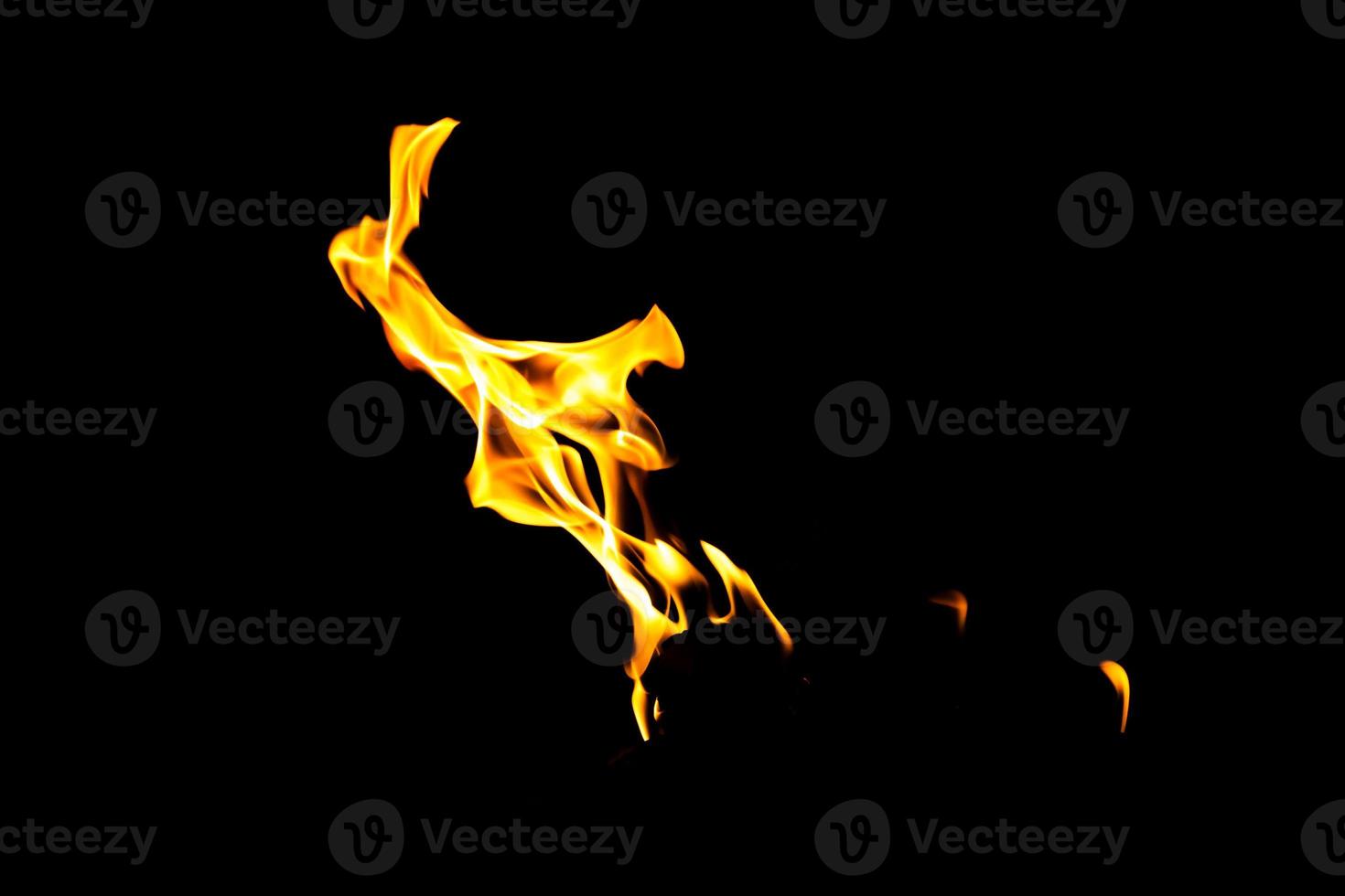 Fire flame texture. Burning material backdrop. Burn effect pattern. Blaze and torch wallpaper. Heat and haze backdrop. photo