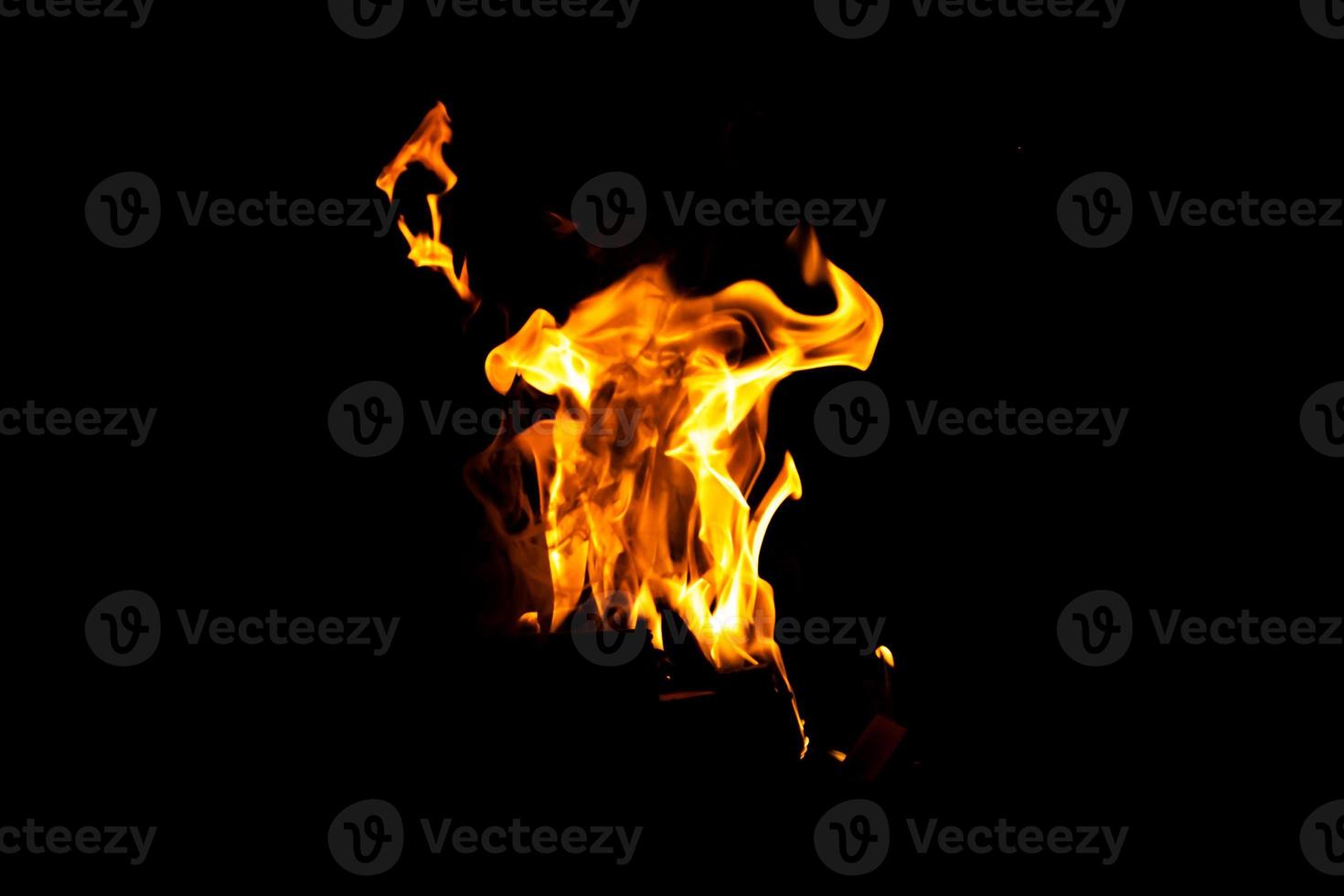 Fire flame texture. Burning material backdrop. Burn effect pattern. Blaze and torch wallpaper. Heat and haze backdrop. photo